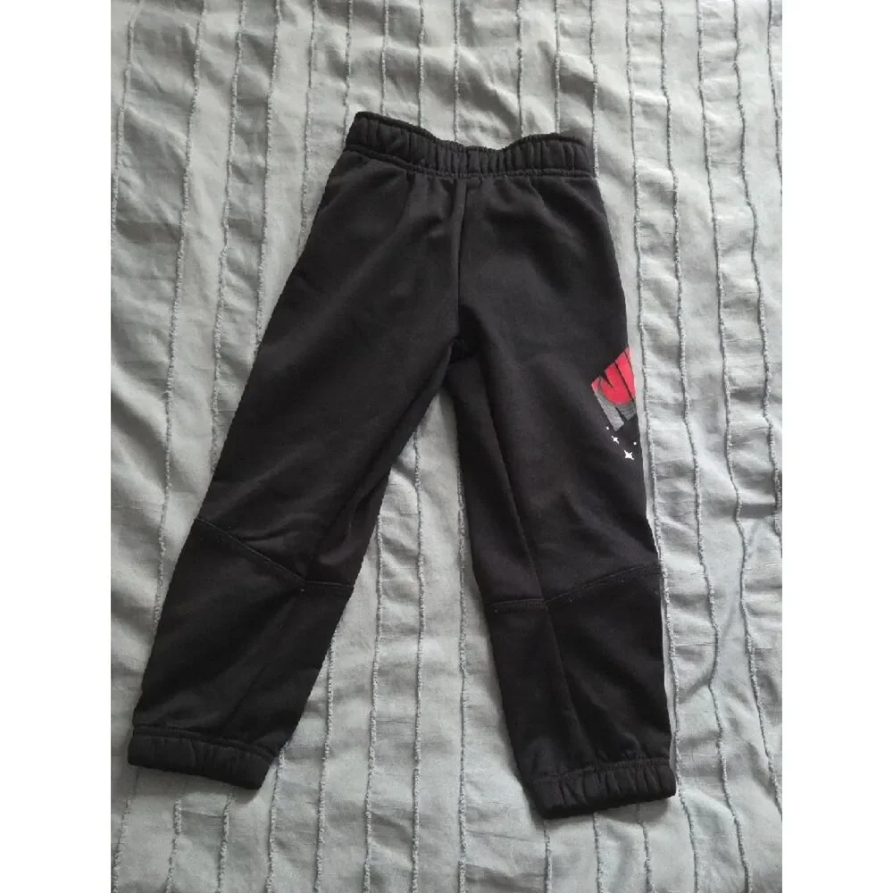 Nike Kids Black Sweatpants with Pink Logo
